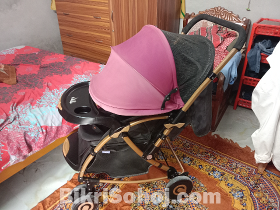 Baby Stroller,  Rocking Mood and Adjustable Handle Bar.